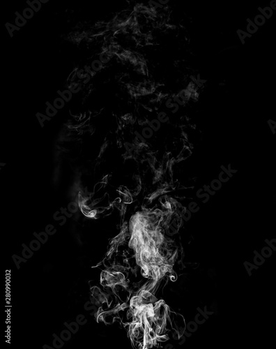 jet of gray smoke on a black background