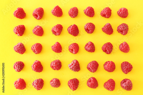 Sweet ripe raspberry on color background