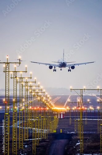 Airplane landing to airport runway