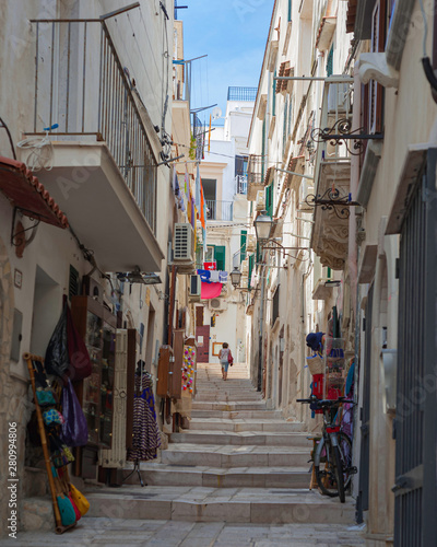 Narrow idyllic streets in ancient Vieste, a small fishing town along the Adriatic Sea in the puglia region of Italy.