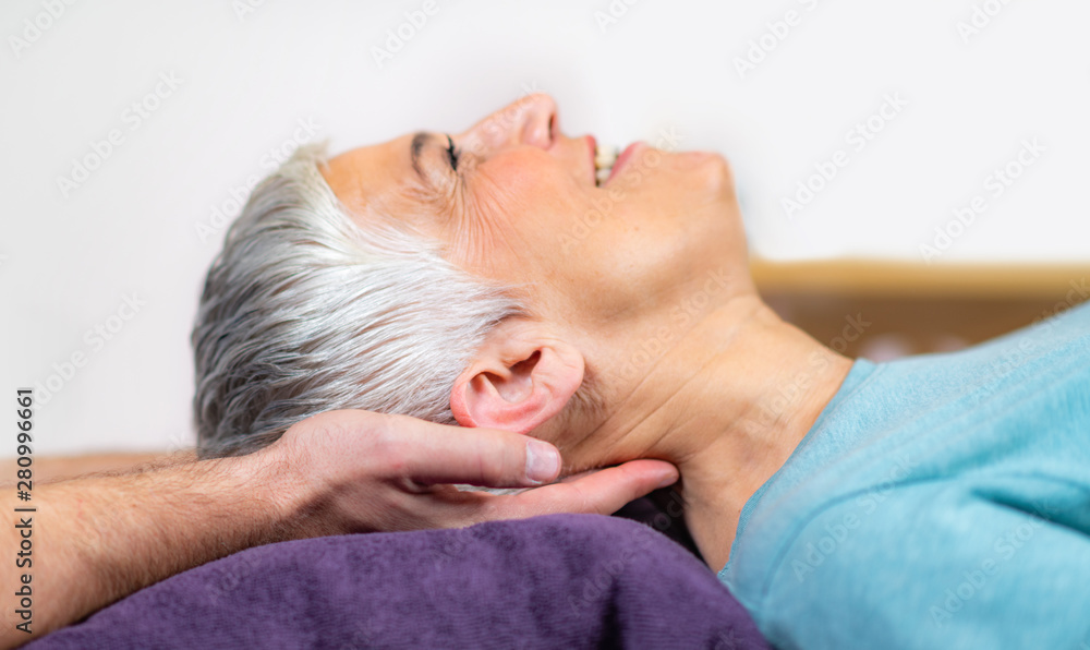 Physical Therapist Working with Neck. Senior Woman Physical Therapist Working with Neck. Senior Woman