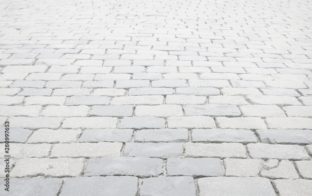 White washed cobblestone pavement background