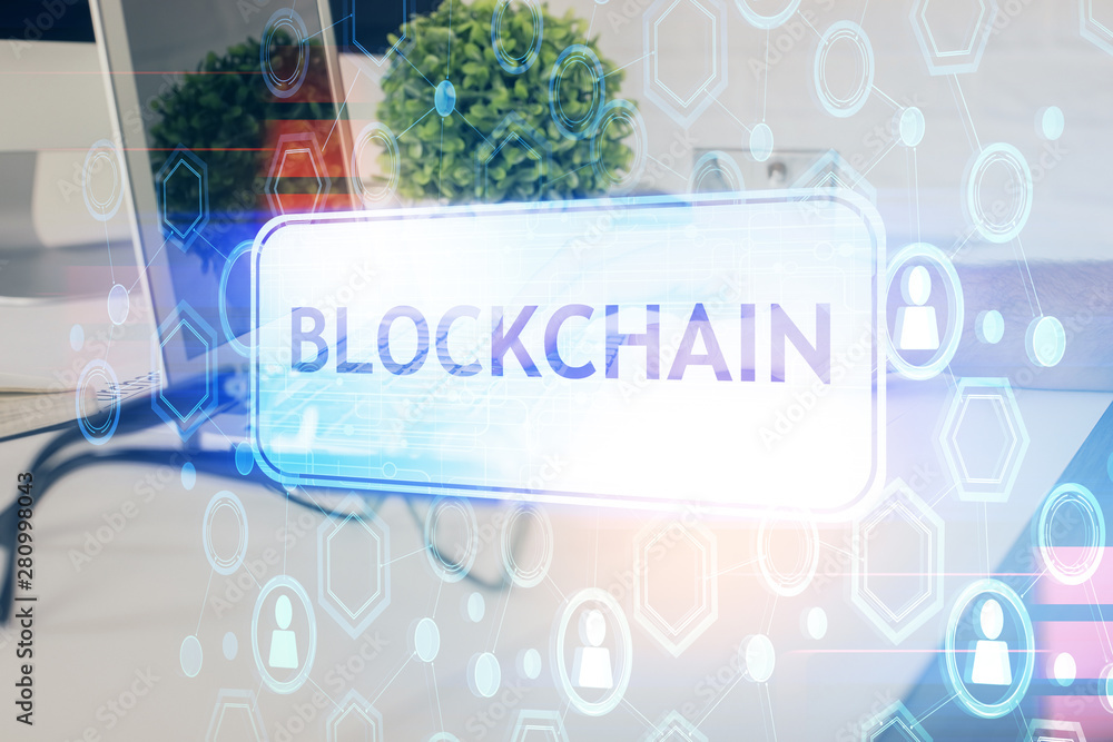 Crypto currency theme hologram with businessman working on computer on background. Concept of blockchain. Multi exposure. Crypto currency theme hologram with businessman working on computer on background. Concept of blockchain. Multi exposure.