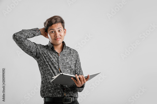 Wallpaper Mural Indian collage boy in study Torontodigital.ca