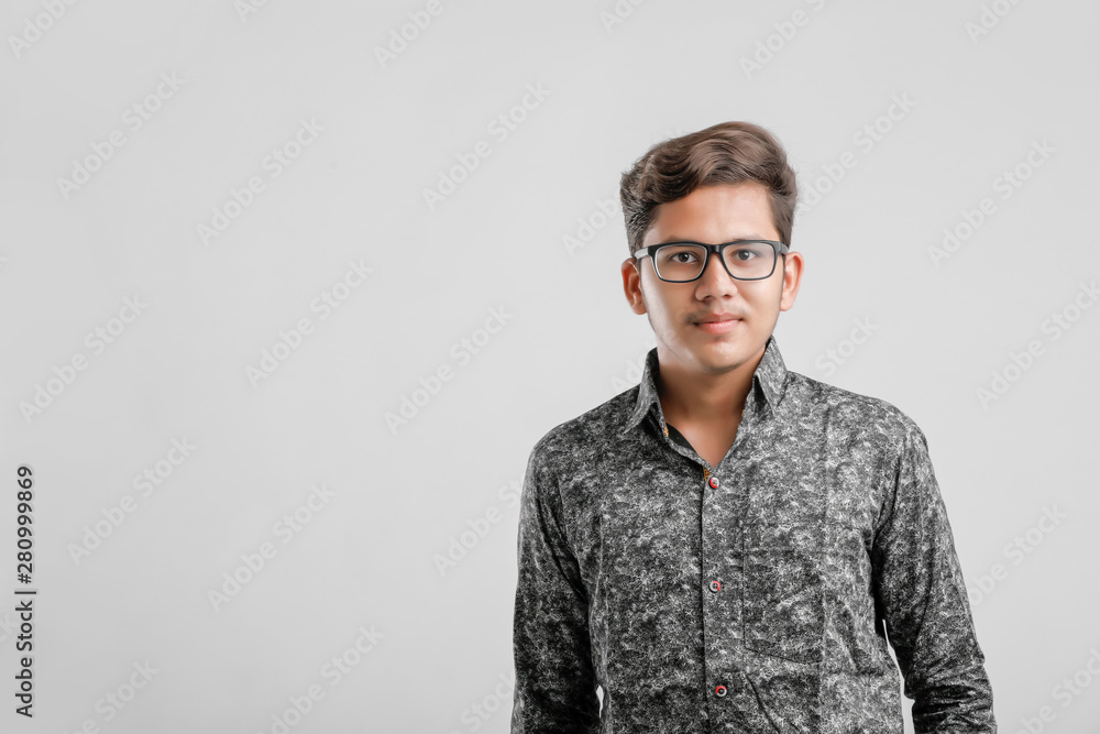 Indian / Asian Collage boy in formal dress and  wearing spectacles