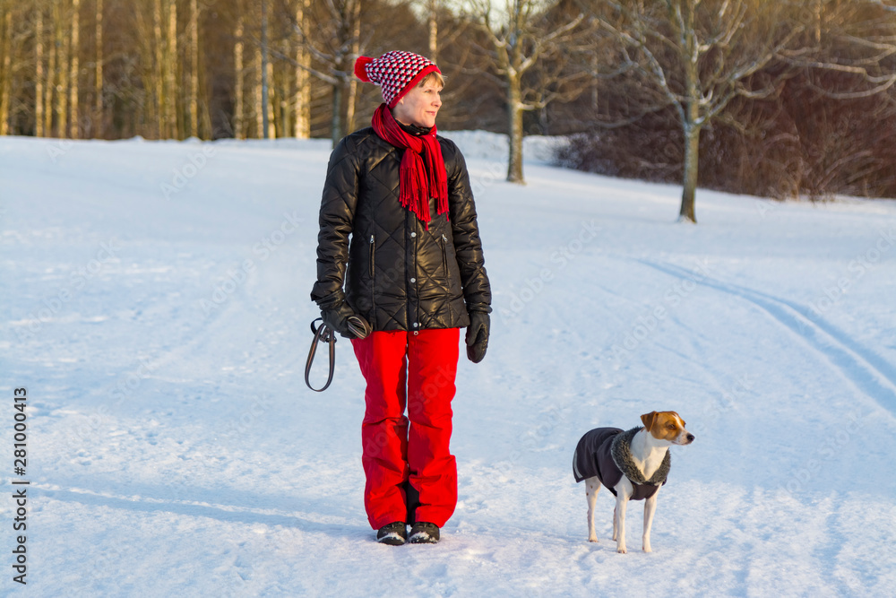 Woman and dog in winter