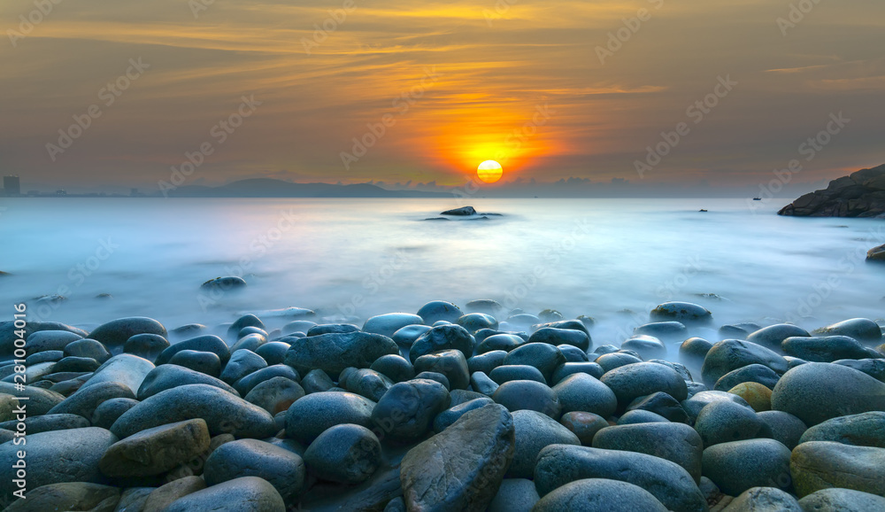 Beautiful Sunrise at rock like eggs beach in Quy Nhon bay, Vietnam Beautiful Sunrise at rock like eggs beach in Quy Nhon bay, Vietnam