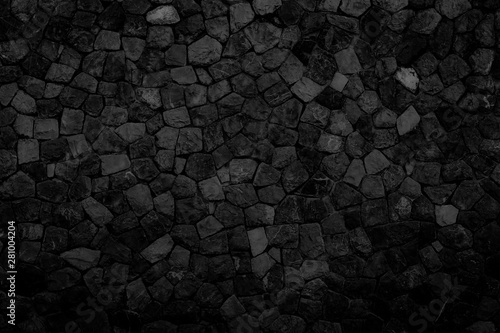 texture of a black stone wall, dark background for design.