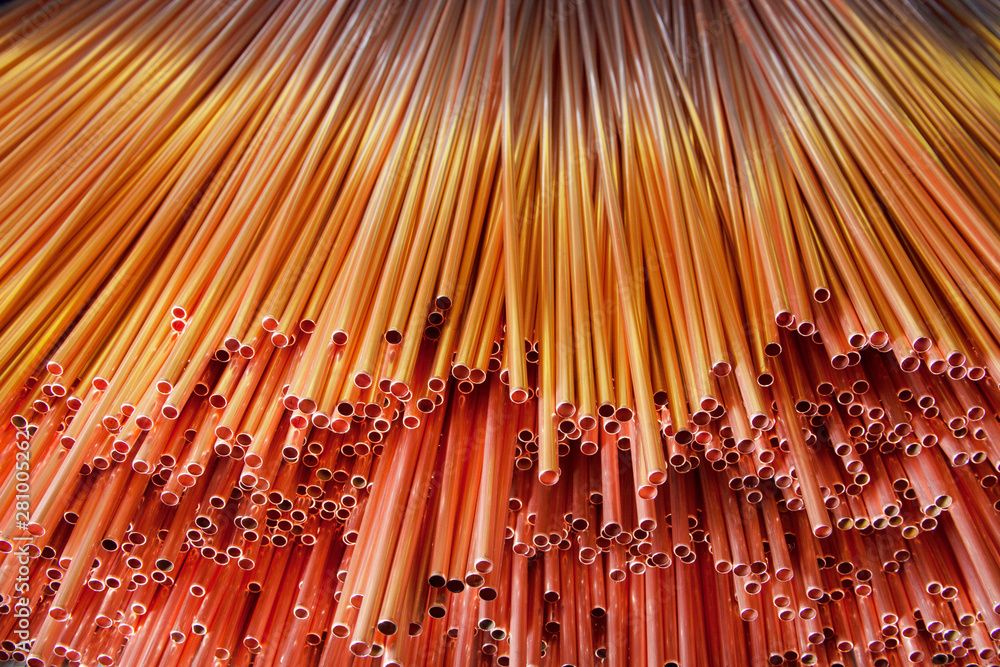 Copper pipes in factory, industrial background Copper pipes in factory, industrial background