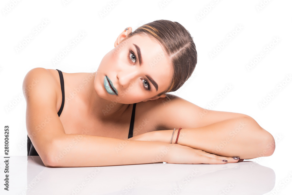 Obraz premium Beauty face makeup. Make up. Eyelashes extensions. Perfect Make-up closeup. Foundation. Cosmetic Eyeshadows, eyebrows. Beauty Girl with Perfect Skin. Eyelashes. Makeover