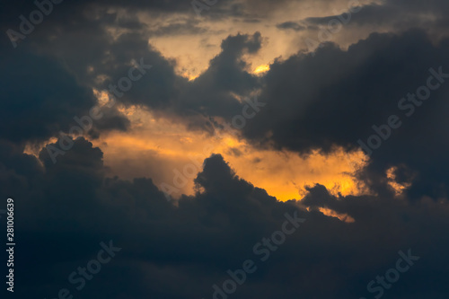 Break in the clouds. Sun emerging behind dark storm clouds © Ian Dyball