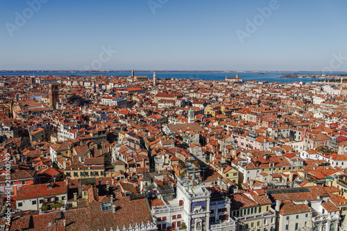 Rooftops panoramic north view with low rise buildings with red tiles, seen from St. Marks Campanile, Venice, Veneto