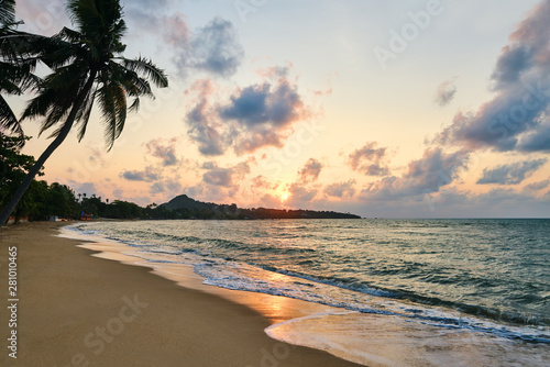 Amazing sunset at the beach on tropical island