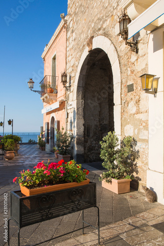 The Porta di Mezzo, western entrance to Piazza IX Aprile, early morning, Taormina, Messina, Sicily, Mediterranean photo