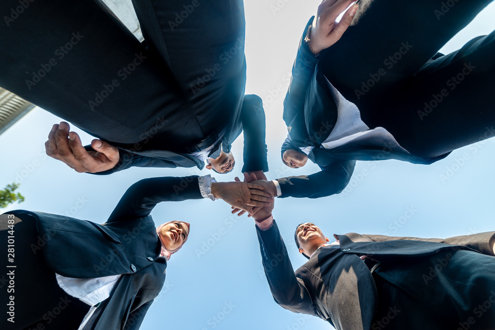Muslim Business People join hands together. Team Teamwork Togetherness Collaboration Concept. Muslim Business People join hands together. Team Teamwork Togetherness Collaboration Concept.