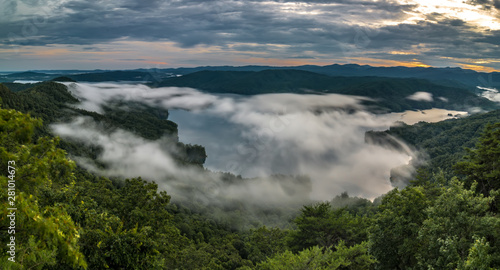 Fototapeta Naklejka Na Ścianę i Meble -  sunset over lake jcassee from jumping off rock overlook
