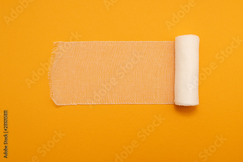 medical bandage isolated on yellow background photo