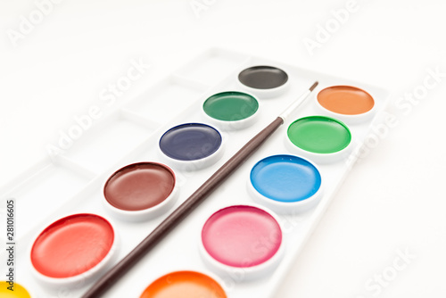 Top view of watercolor paint in box on white background