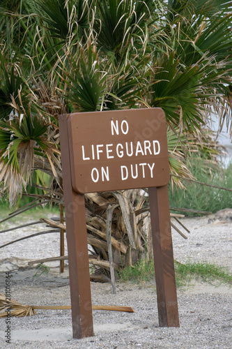 no life guard on duty sign on state beach photo