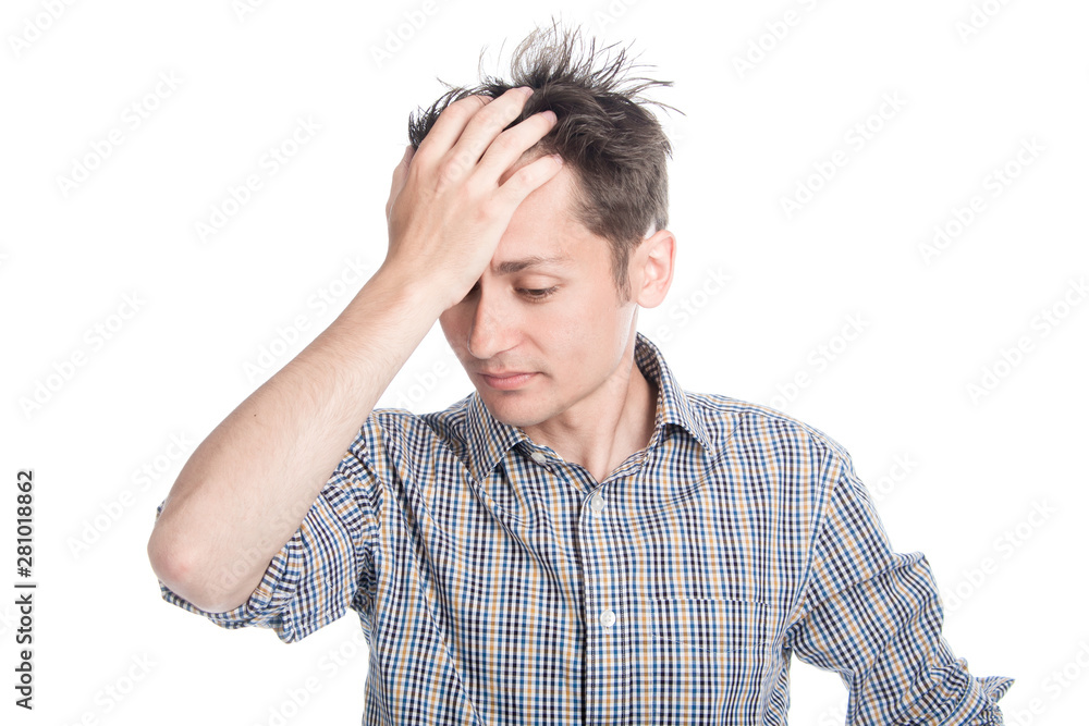 Thinking man with hand on forehead over white background. Isolated. Thinking man with hand on forehead over white background. Isolated.