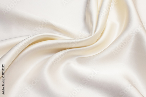 Abstract background texture of natural light color fabric. Fabric texture of natural cotton or linen, silk or satin, wool or jersey textile material. Luxurious white canvas background. photo