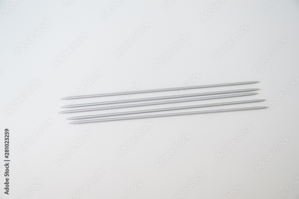 metal gray spokes on a white background, five pieces, hosiery spokes metal gray spokes on a white background, five pieces, hosiery spokes