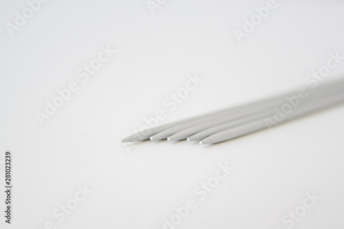 metal gray spokes on a white background, five pieces, hosiery spokes