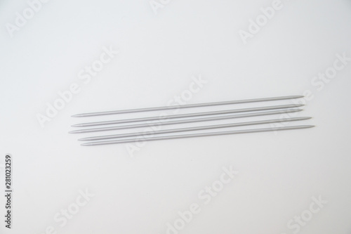 metal gray spokes on a white background  five pieces  hosiery spokes