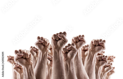 Large group of raised hands showing fists isolated on white background  photo