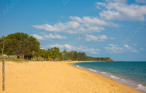Koh Samui tropical beach with coconut palm trees and golden sand