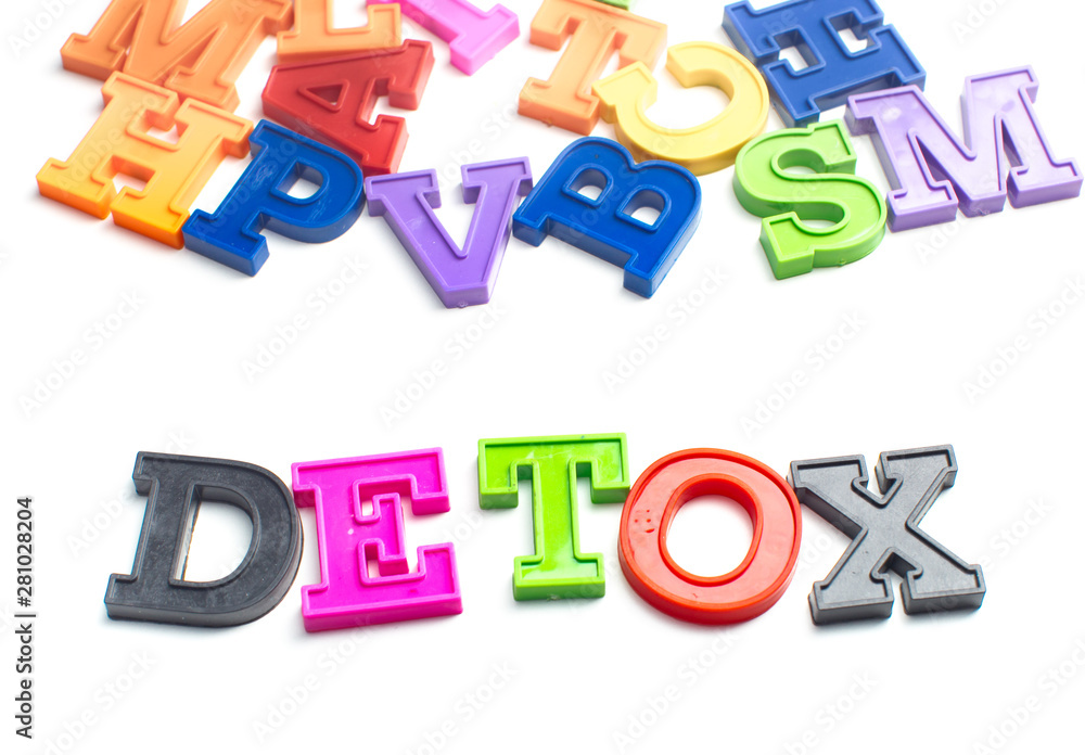 Heap of plastic colored alphabet letters close up. Detox Heap of plastic colored alphabet letters close up. Detox