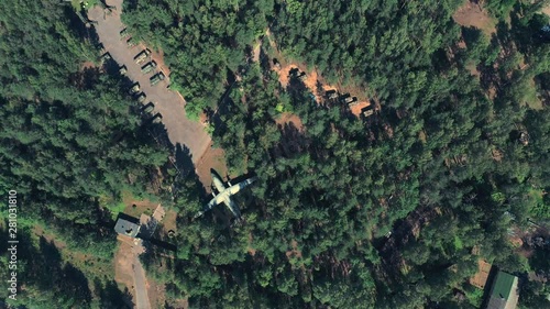 Top view spy drone shooting a russian military base with airplanes