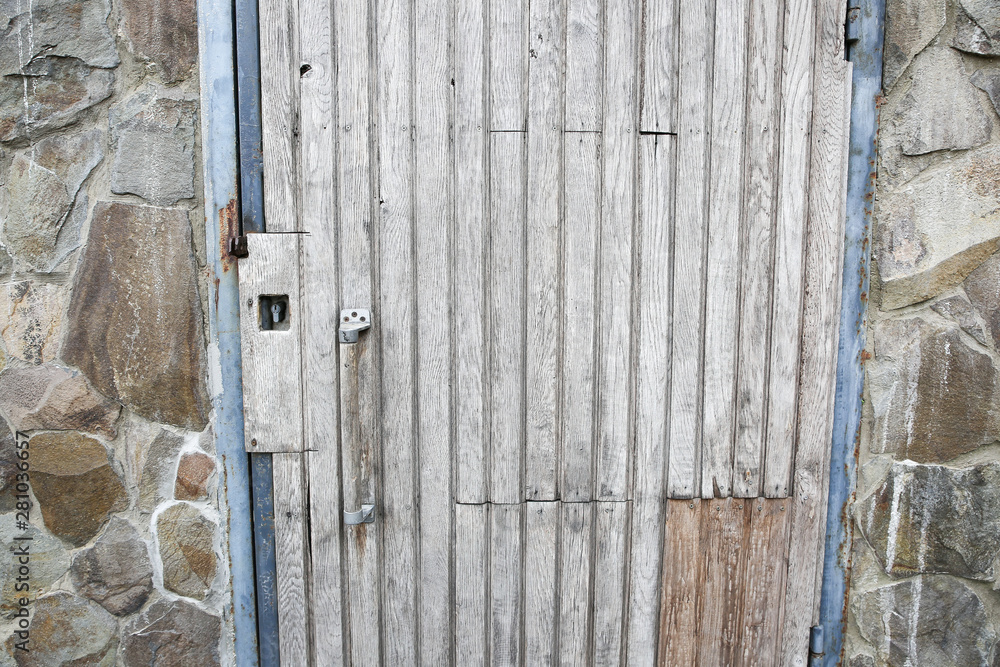 Old wooden doors with planks. Old wooden doors with planks.