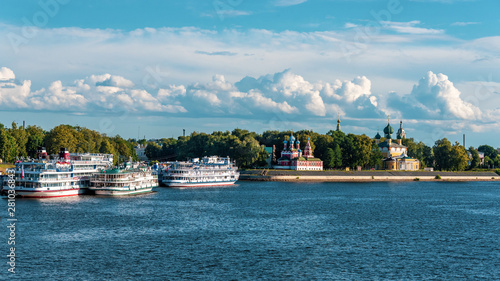 Tableau sur toile Cruise ship at the pier in the ancient Russian city of Uglich