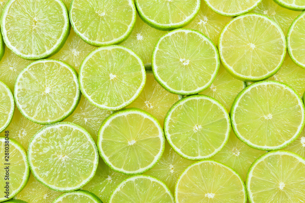 Fresh lime slices as a background. Fresh lime slices as a background.