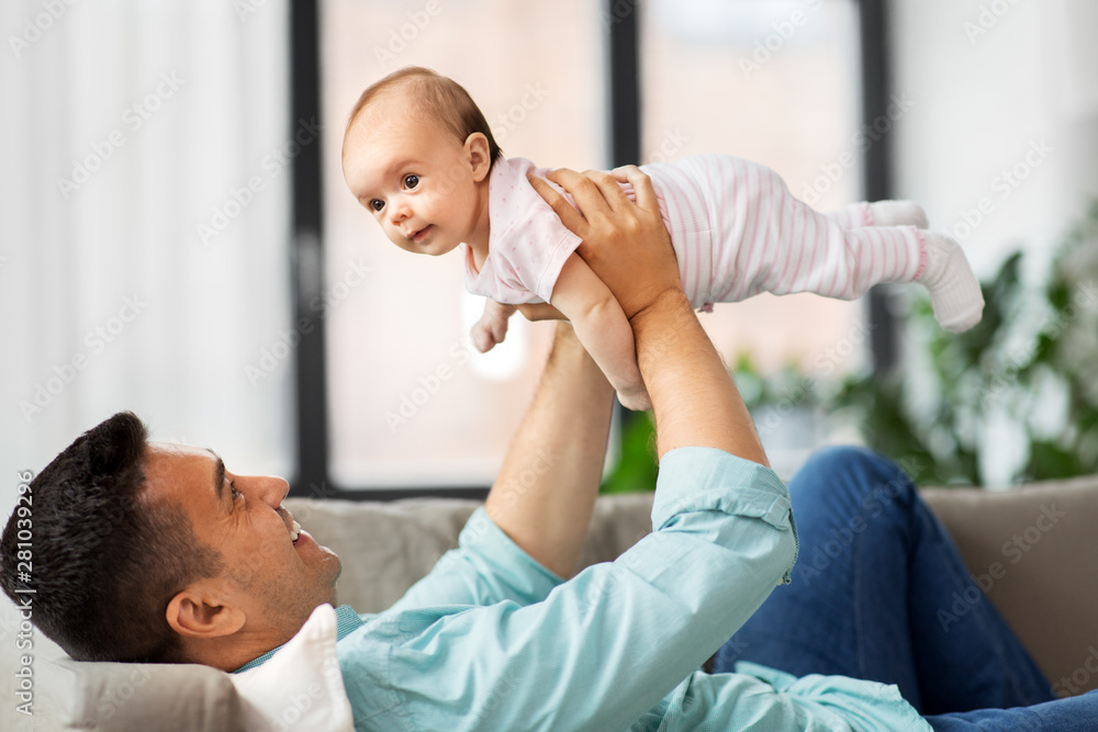 Fototapeta premium family, parenthood and fatherhood concept - happy middle aged father with little baby daughter at home