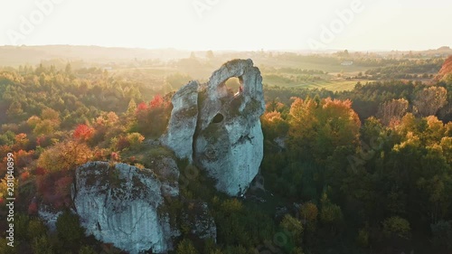 A panoramic view of the unique Okiennik rock in Poland with a large natural window