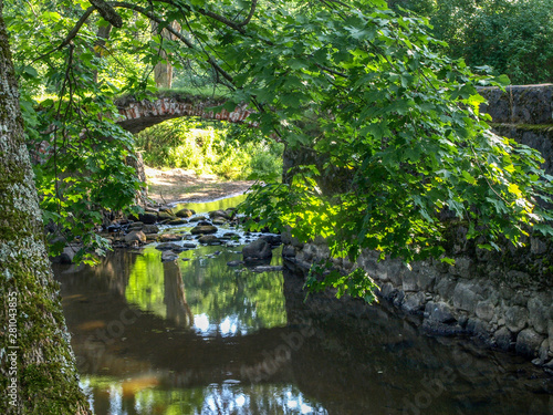 beautiful stone bridge over the river Kuja, beautiful morning light, deep shadows