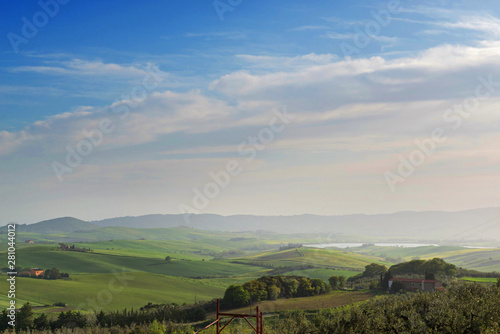 Beautiful spring evening froggy landscape in Tuscany countryside, Italy
