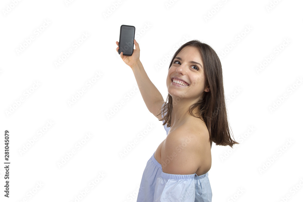Attractive young girl taking a selfie on a white background Attractive young girl taking a selfie on a white background