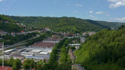 Aerial view of the city Oberndorf in Germany. Flying along the industrial part of thetown. photo