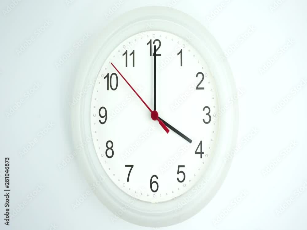 Closeup White wall clock face beginning of time 04.00 am or pm, Clock minute walk slowly, Time concept. Closeup White wall clock face beginning of time 04.00 am or pm, Clock minute walk slowly, Time concept.