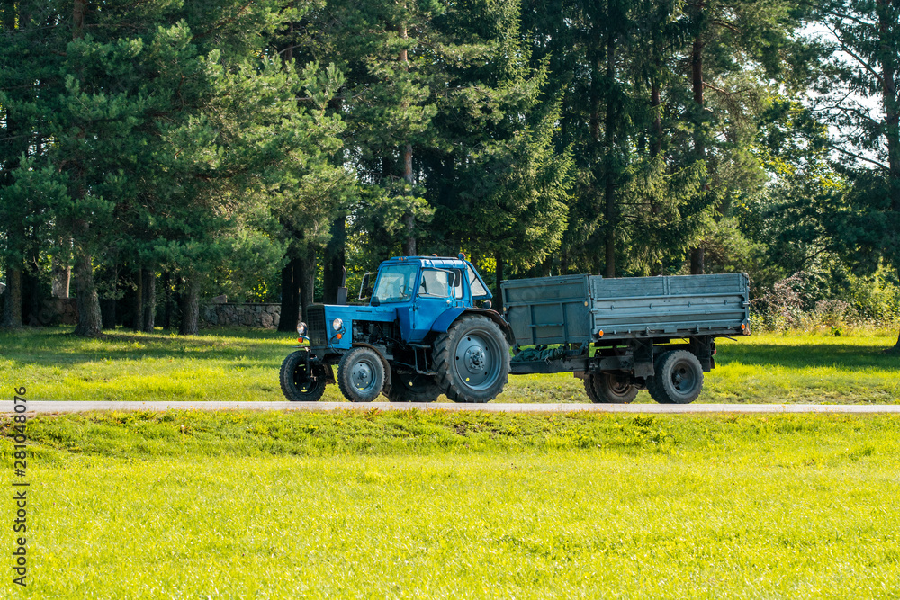 Fototapeta premium Tractor with a trailer