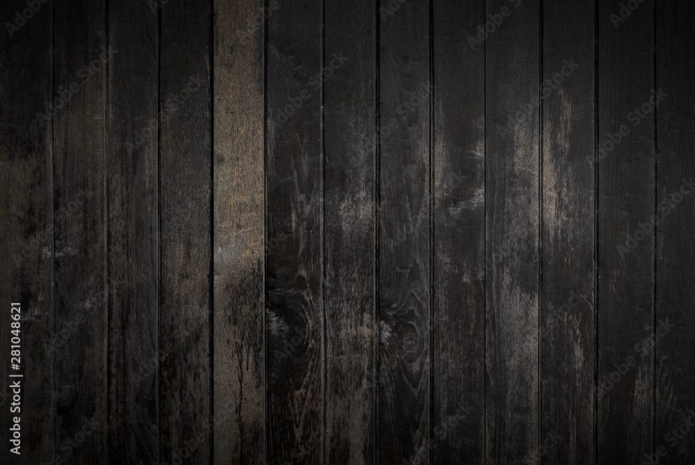 Black wood texture background coming from natural tree. The wooden panel has a beautiful dark pattern that is empty. Black wood texture background coming from natural tree. The wooden panel has a beautiful dark pattern that is empty.