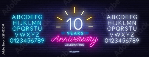 10 anniversary celebration neon sign on a dark background.