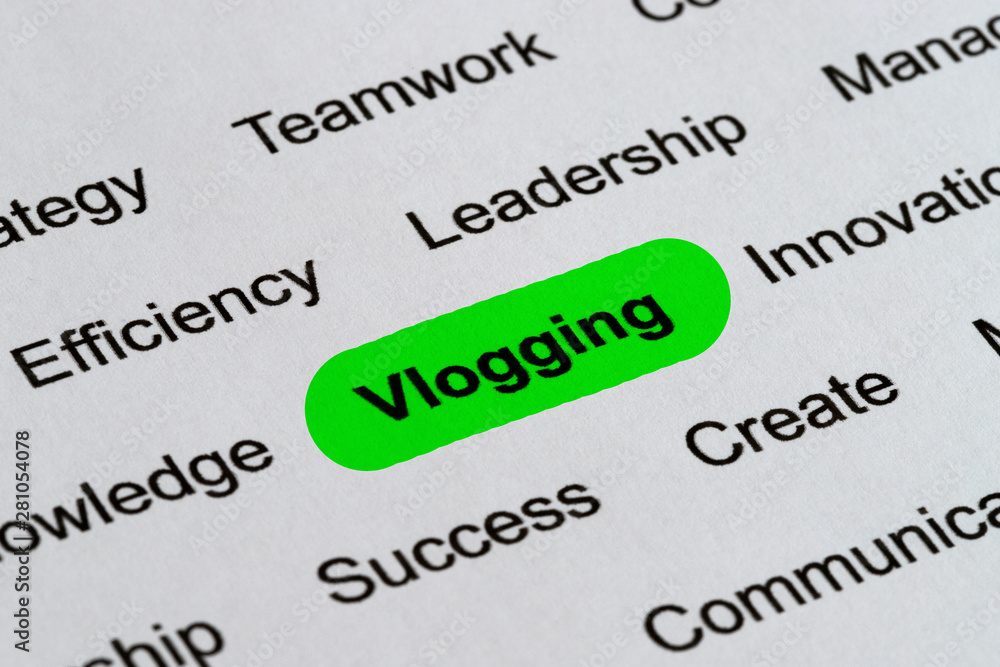 Vlogging - Technology Business Buzzwords, printed on white paper and highlighted Vlogging - Technology Business Buzzwords, printed on white paper and highlighted