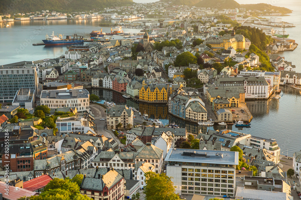From the bird's eye view of Alesund port town on the west coast of Norway, at the entrance to the Geirangerfjord. Colorful morning scene of the Nord. Traveling concept background.