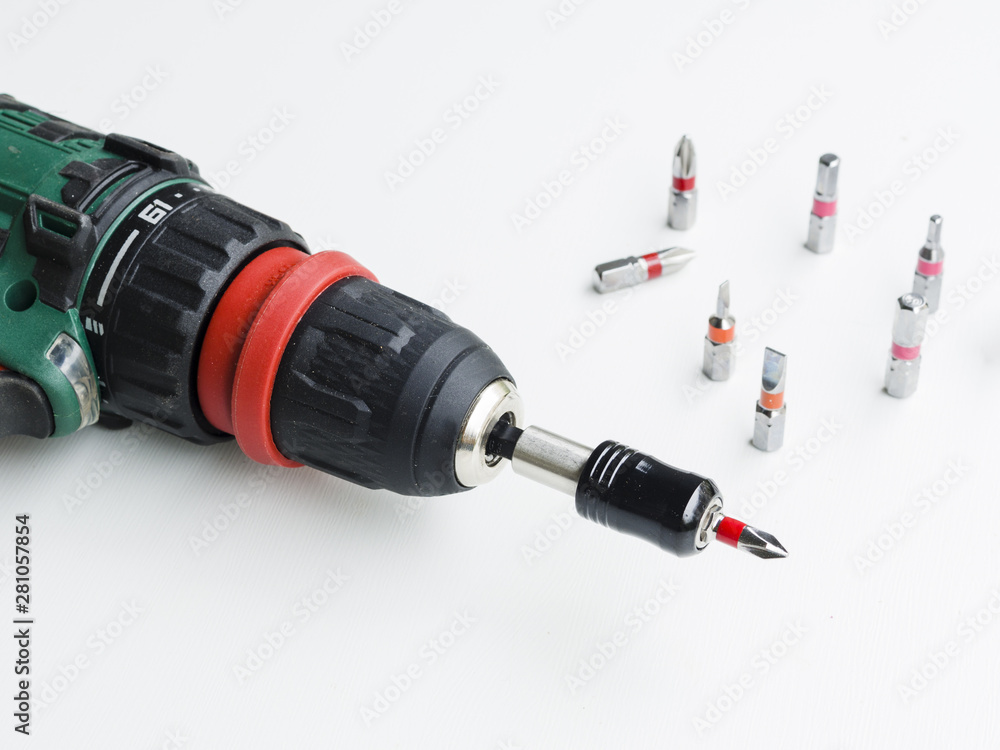 Perforator and nozzles on white table Perforator and nozzles on white table