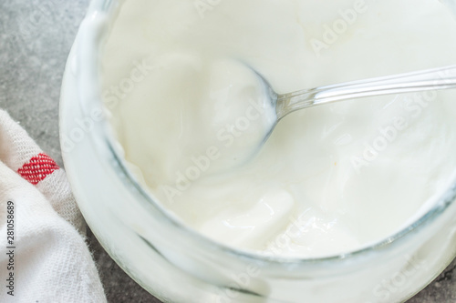 Homemade Goat Yogurt in Glass Bowl with Spoon / Probiotic Custard