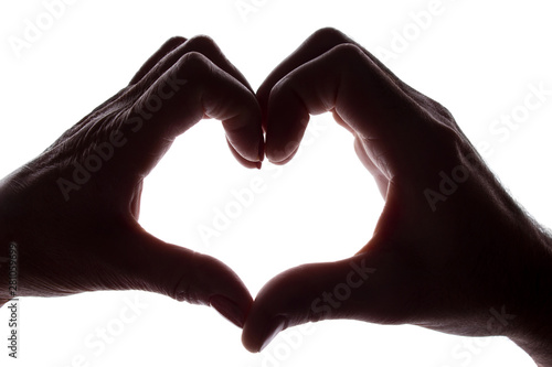 Female and male hands as a symbol of the heart